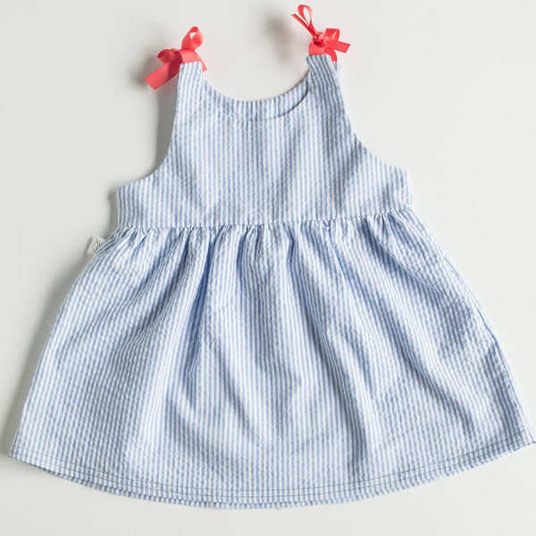 global wonders, products of hope, handmade, made by survivors, human trafficking, fair wage, skill development, designed by survivors, made in Canada, designed in Canada, SA Foundation, textiles, accessories, fashion with purpose, cute baby clothes, ethically made, fashion for good, spring collection, baby sundress, ribbon straps, 0-12mos.