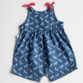 global wonders, products of hope, handmade, made by survivors, human trafficking, fair wage, skill development, designed by survivors, made in Canada, designed in Canada, SA Foundation, textiles, accessories, fashion with purpose, cute baby clothes, ethically made, fashion for good, spring collection, baby romper, ribbon straps, 0-12mos.